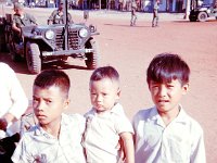 Kids on the main street in beautiful downtown Phouc Vinh. We also called the town “Pee Vee” or “Poppa Victor”.